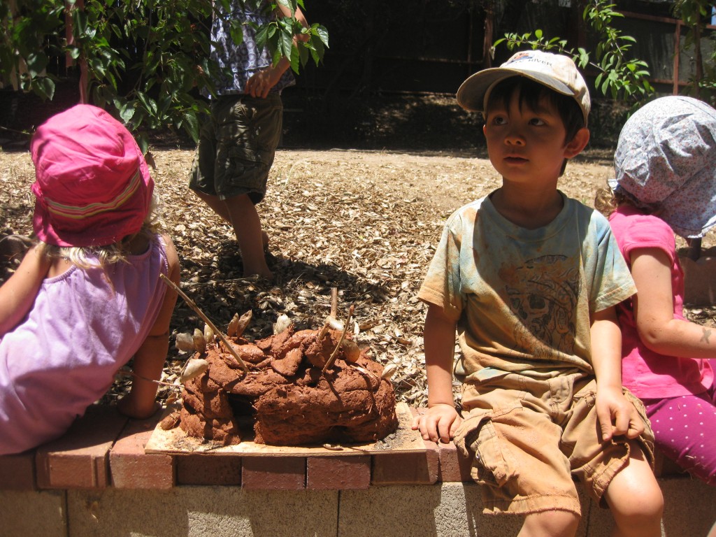 Made cobb house at Pine Manor with clay, straw, sand, and water.